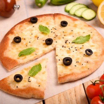 جبنة صفراء مع زيتون اخضر